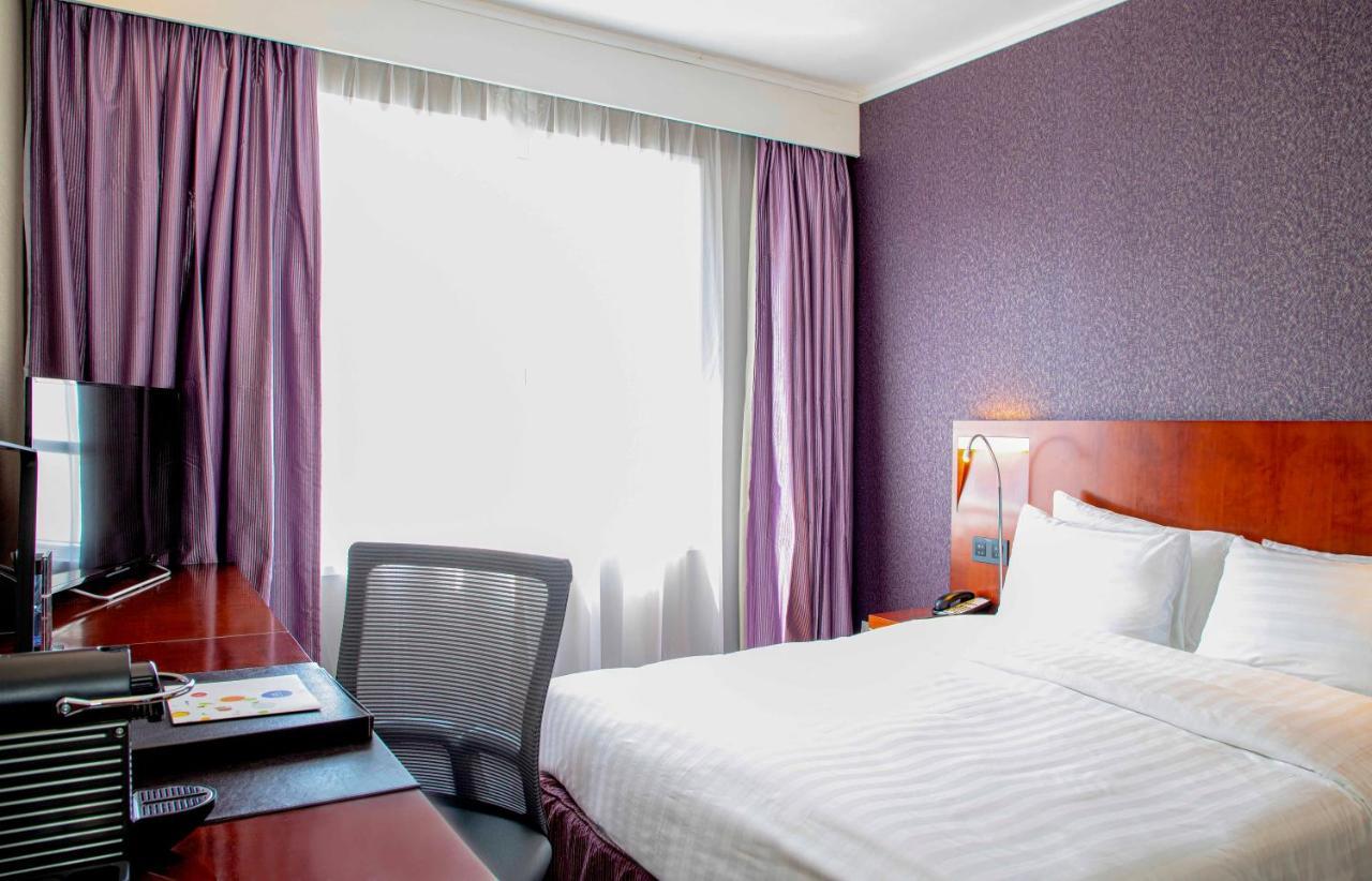 Отель Novotel Century